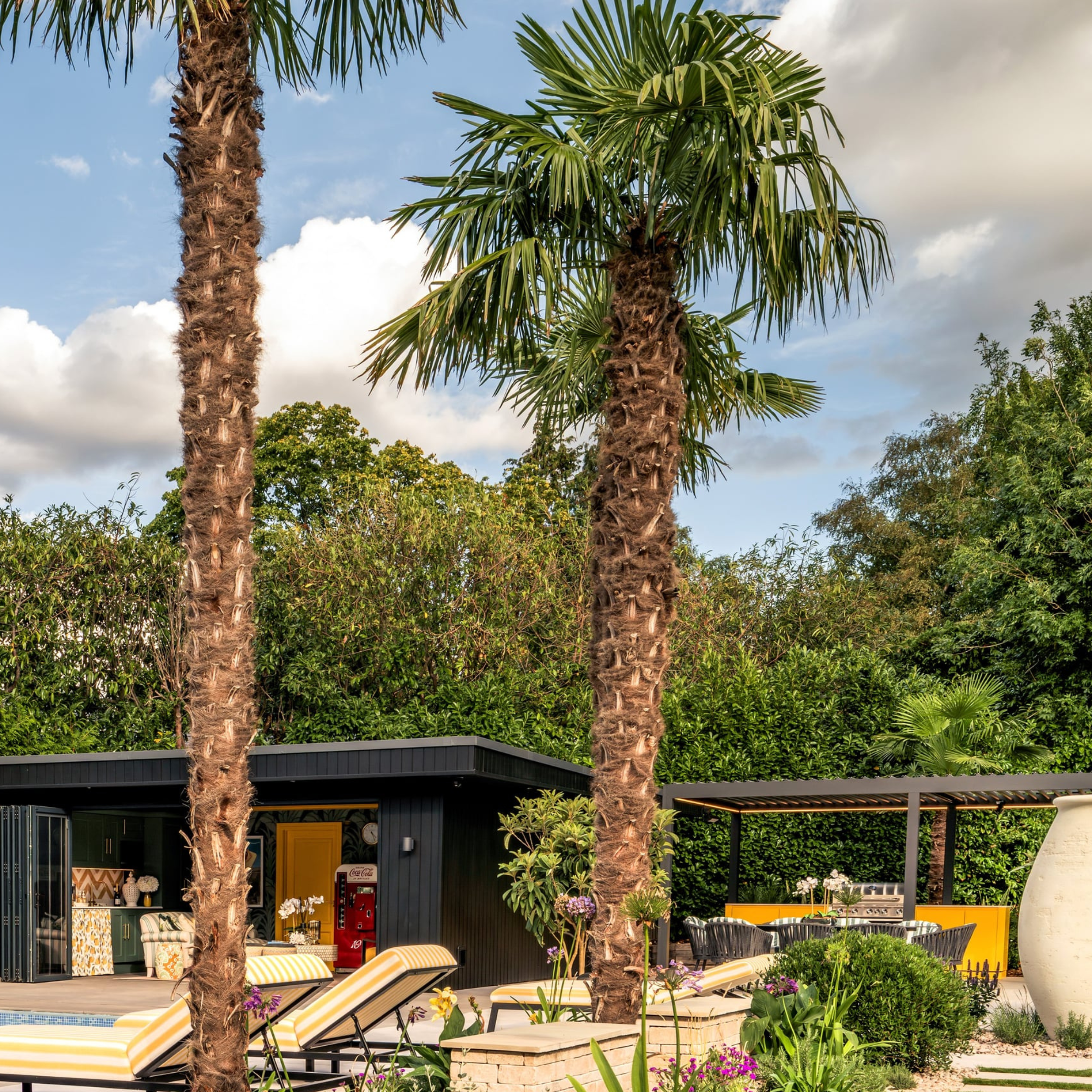 Yellow outdoor kitchen in Surrey LA vibe garden design