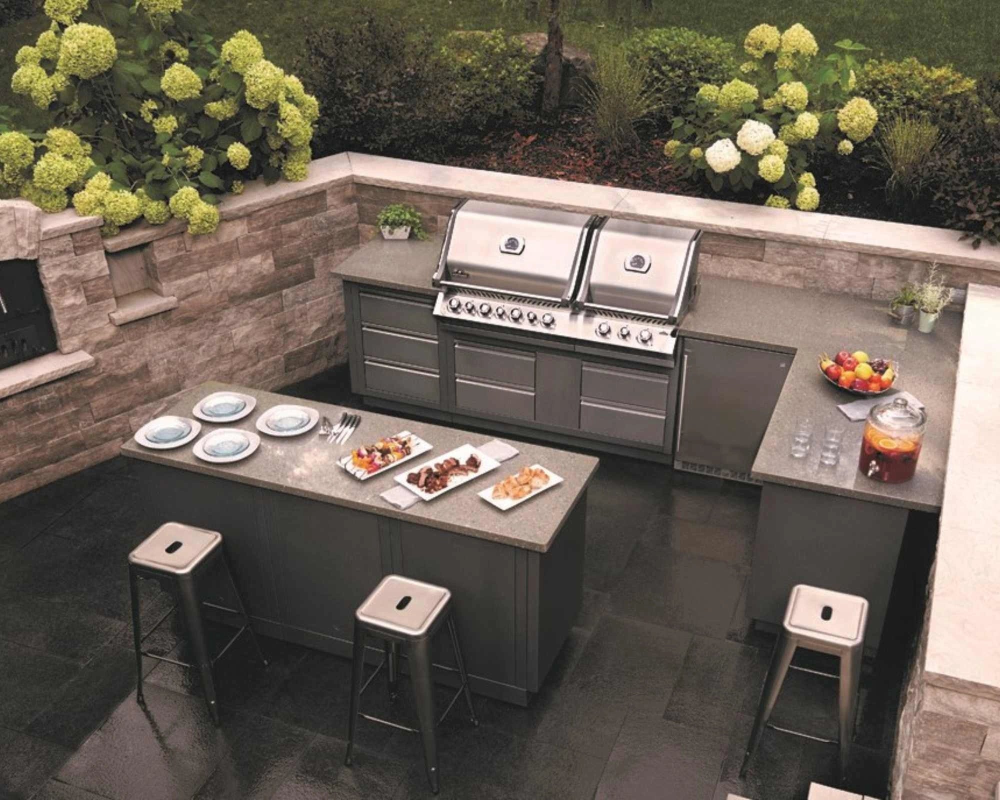 Load video: The Outdoor Kitchen - an example of a bespoke garden kitchen at Cedar Nursery, Cobham, Surrey