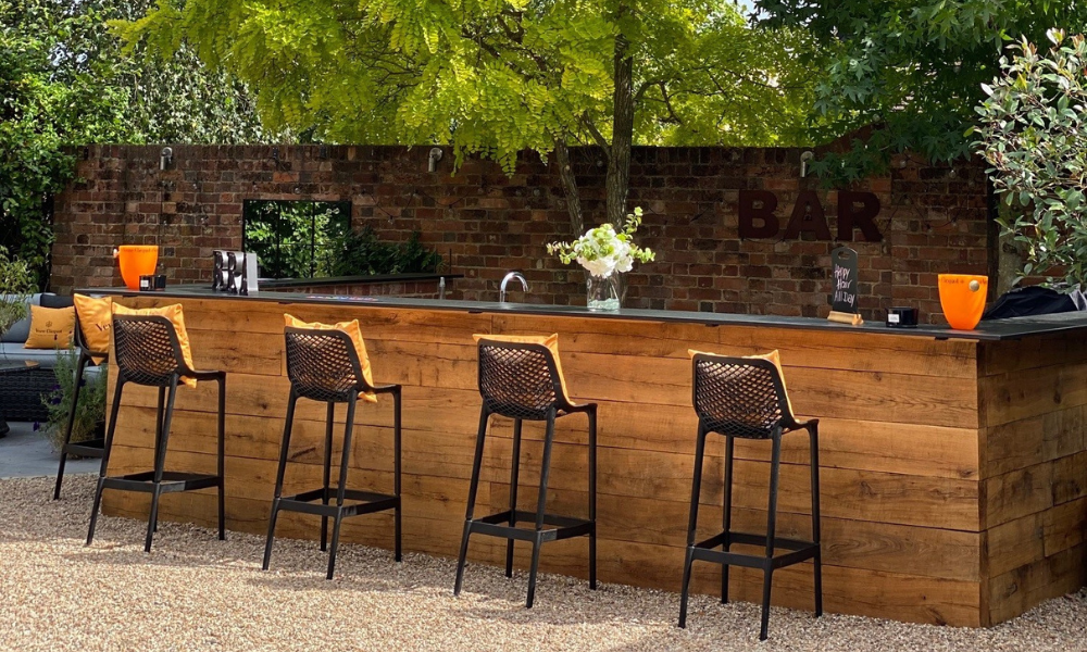 Outdoor bar area designed by Kitchen in the Garden at Cedar Nursery, Surrey