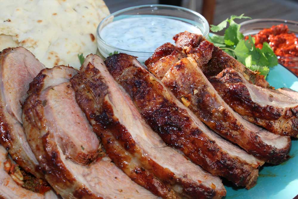 Harissa Lamb on the Rotisserie - Kitchen In The Garden