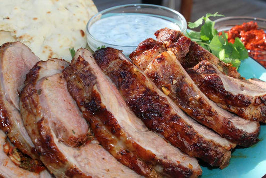 Harissa Lamb on the Rotisserie - Kitchen In The Garden
