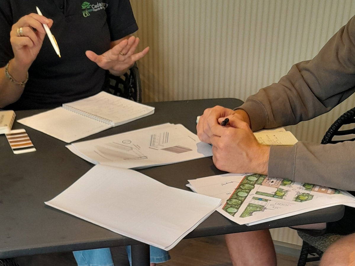 Design consultation at the meeting room table in the Kitchen in the Garden showroom